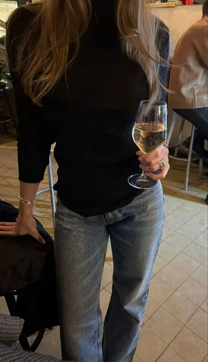 "Ida in our turtleneck sweater"